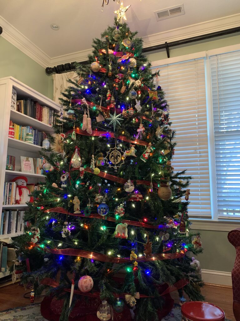 decorated christmas tree in a library